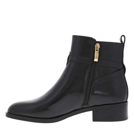 Boots en cuir noires à talon décroché bas avec un zip latéral doré - Image 3