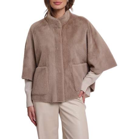 Gilet beige coupe ample pourvu d'un léger col montant et de manches courtes